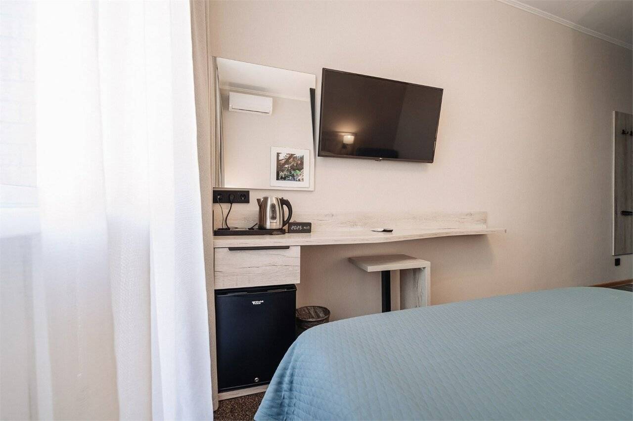 Фотографии номера Семейный 1-комнатный (дабл/твин), Корпус: «Родник» в Гостинице Родник Алтая Белокуриха