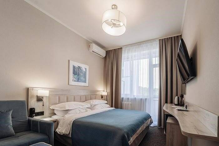 Фотографии номера Семейный 1-комнатный (дабл/твин), Корпус: «Родник» в Гостинице Родник Алтая Белокуриха